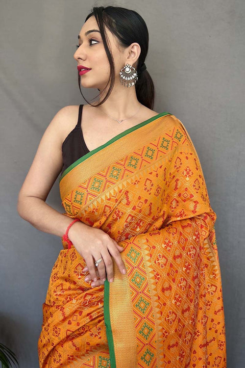 Load image into Gallery viewer, Susurrous Mustard Patola Silk Saree with Denouement Blouse Piece
