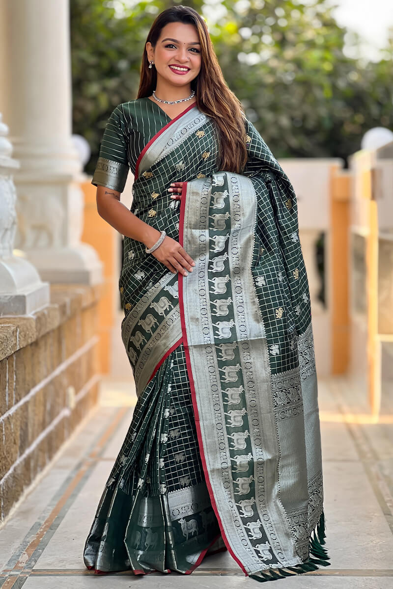 Ephemeral Dark Green Soft Banarasi Silk Saree With Phenomenal Blouse Piece