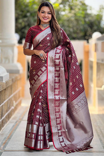 Demure Wine Soft Banarasi Silk Saree With Fancifull Blouse Piece