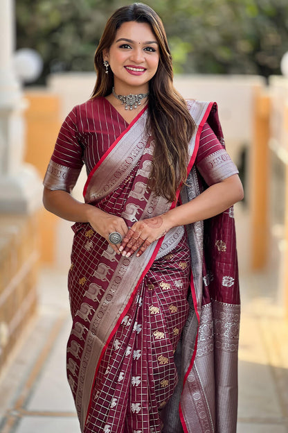 Demure Wine Soft Banarasi Silk Saree With Fancifull Blouse Piece