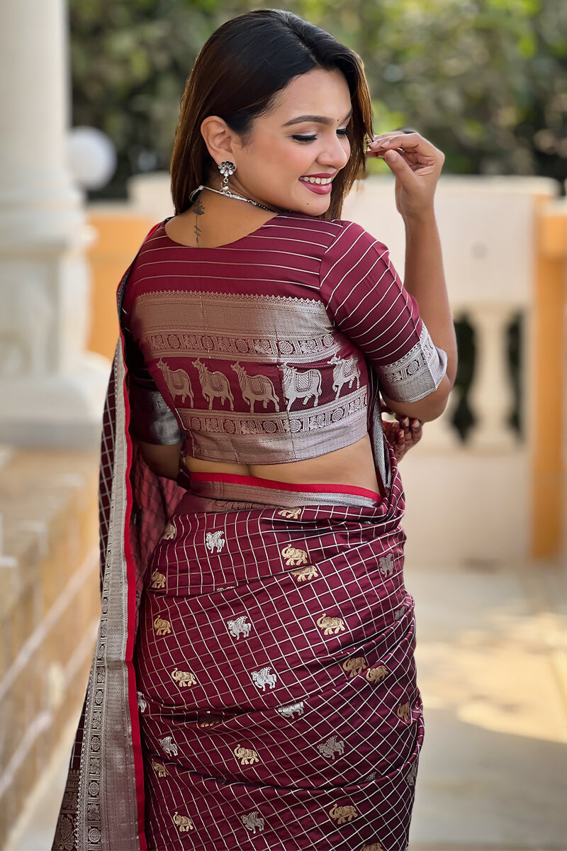 Demure Wine Soft Banarasi Silk Saree With Fancifull Blouse Piece