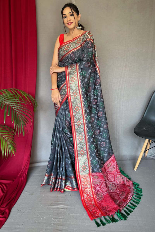 Load image into Gallery viewer, Forbearance Black Patola Silk Saree with Cynosure Blouse Piece
