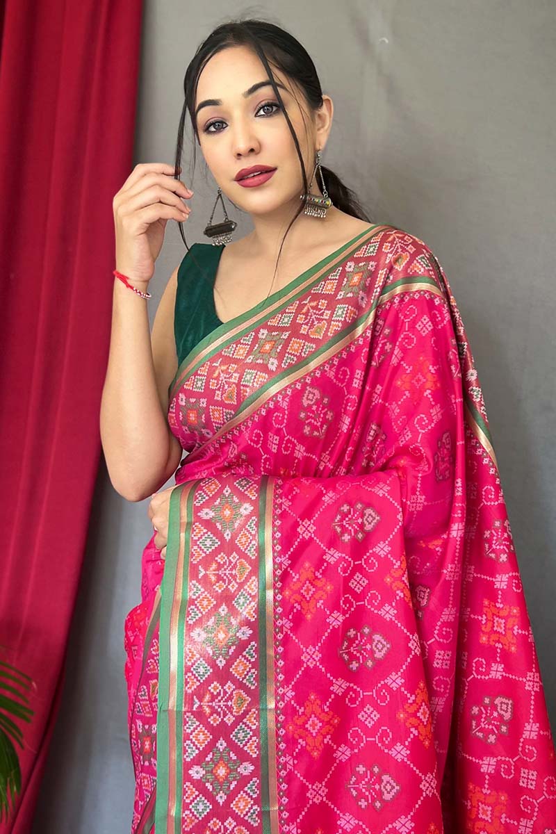 Enchanting Dark Pink Patola Silk Saree with Magnificat Blouse Piece