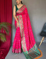 Enchanting Dark Pink Patola Silk Saree with Magnificat Blouse Piece