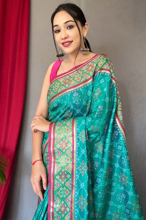 Load image into Gallery viewer, Pleasurable Turquoise Patola Silk Saree with Snappy Blouse Piece
