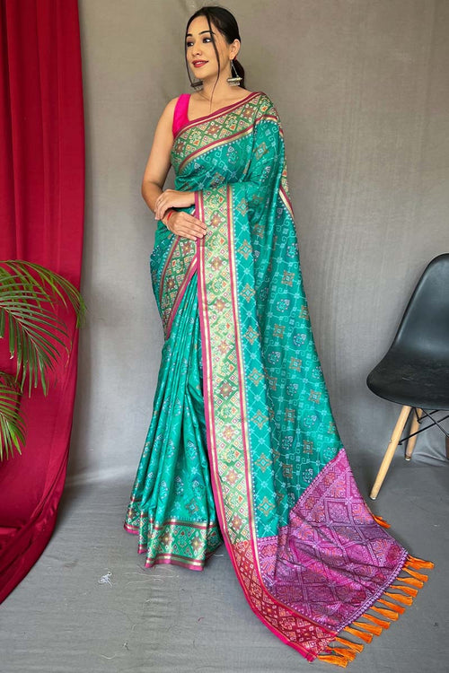 Load image into Gallery viewer, Pleasurable Turquoise Patola Silk Saree with Snappy Blouse Piece
