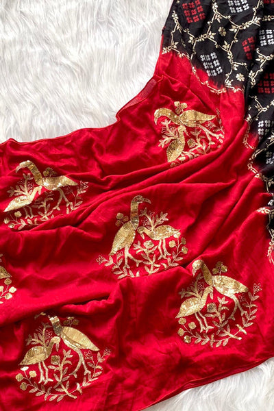 Cynosure Red Sequence Work Georgette Saree With Stunner Blouse Piece