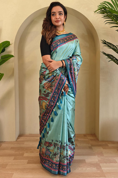 Energetic Sea Green Kalamkari Printed Viscose Dola Silk Saree With Capricious Blouse Piece