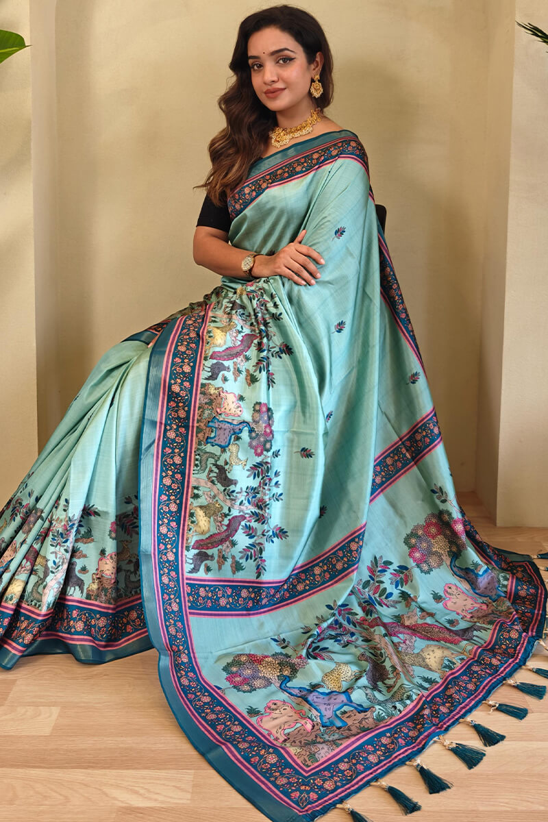 Energetic Sea Green Kalamkari Printed Viscose Dola Silk Saree With Capricious Blouse Piece