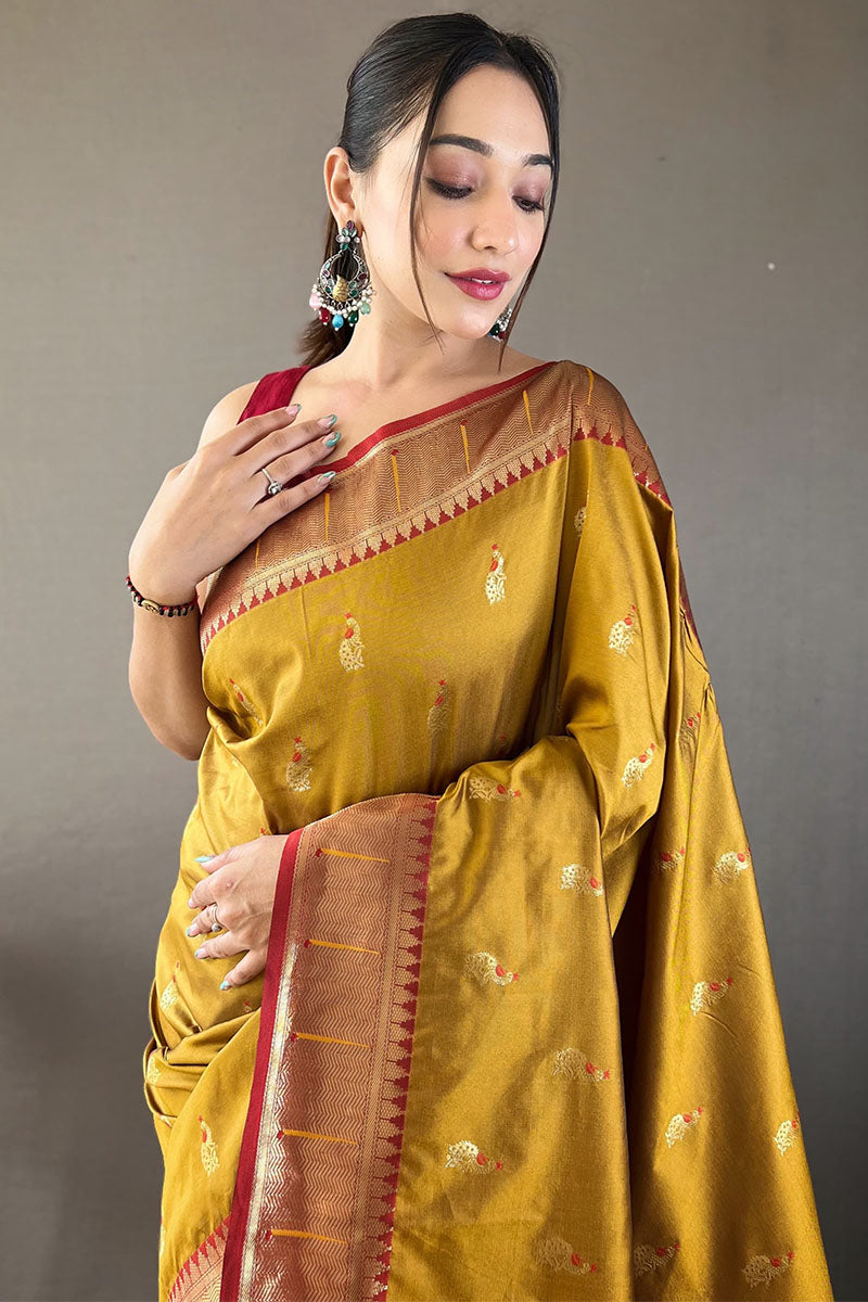 Flattering Mustard Paithani Silk Saree With Adorning Blouse Piece