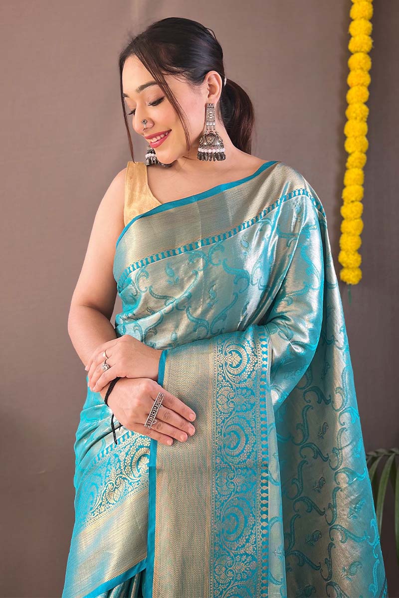 Desirable Firozi Kanjivaram Silk Saree With Adoring Blouse Piece