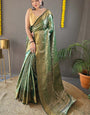 Desuetude Green Kanjivaram Silk Saree With Fugacious Blouse Piece