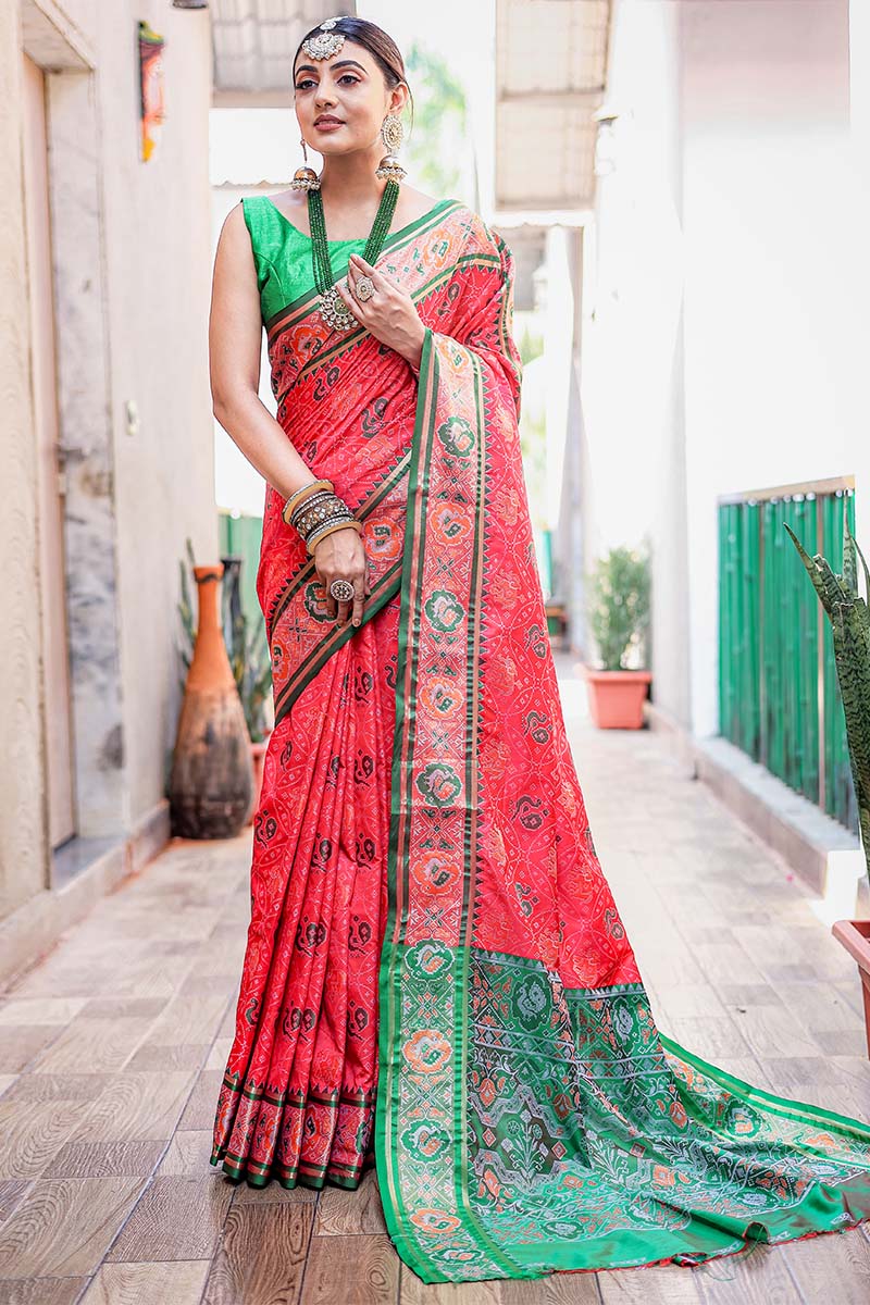 Fairytale Dark Pink Patola Silk Saree with Opulent Blouse Piece