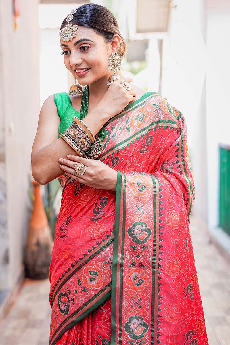 Fairytale Dark Pink Patola Silk Saree with Opulent Blouse Piece