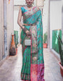 Alluring Rama Patola Silk Saree with Charming Blouse Piece