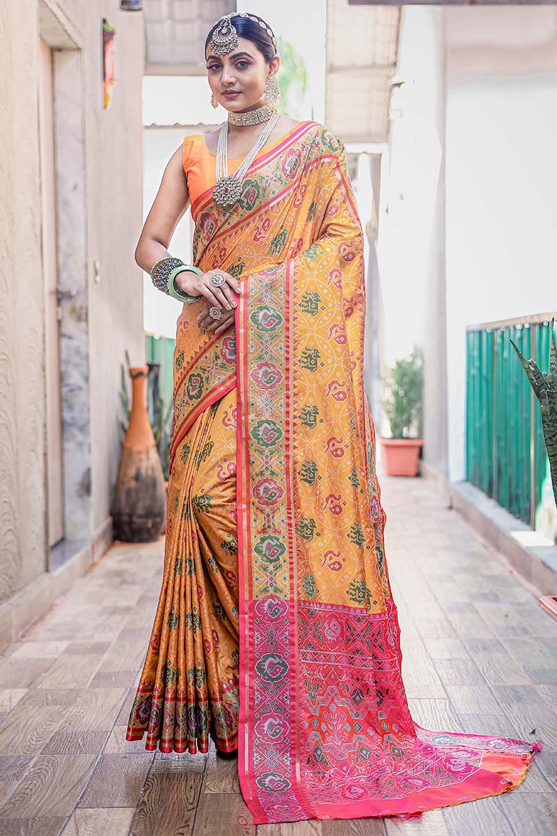 Prettiest Yellow Patola Silk Saree with Fairytale Blouse Piece