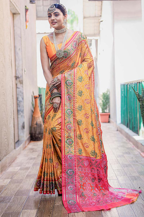 Load image into Gallery viewer, Prettiest Yellow Patola Silk Saree with Fairytale Blouse Piece
