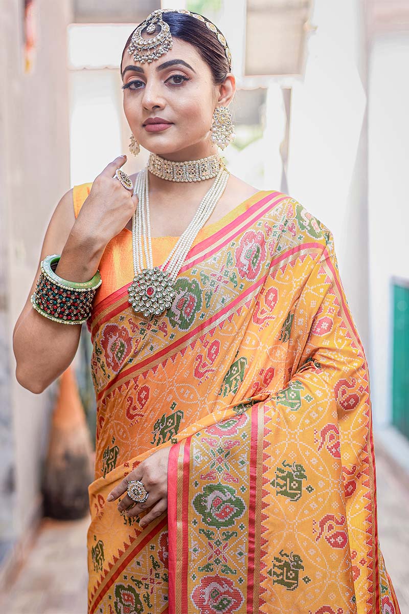 Prettiest Yellow Patola Silk Saree with Fairytale Blouse Piece