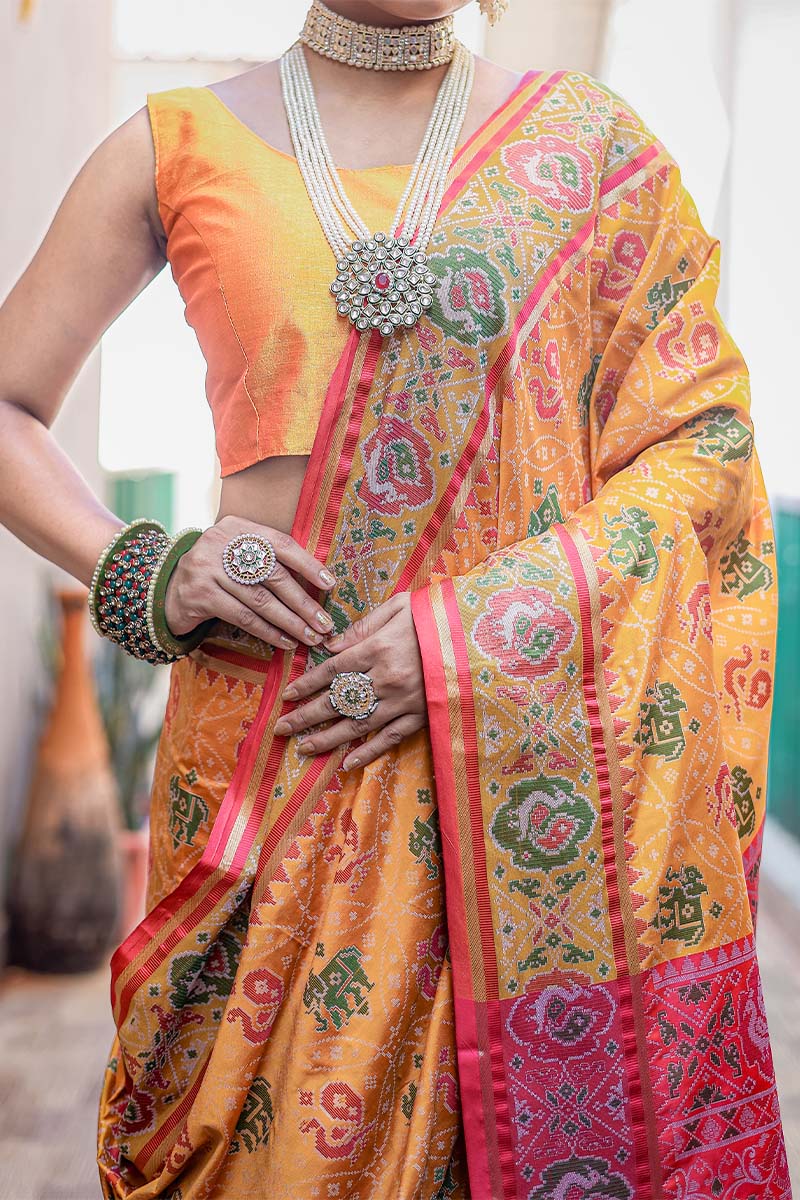 Prettiest Yellow Patola Silk Saree with Fairytale Blouse Piece