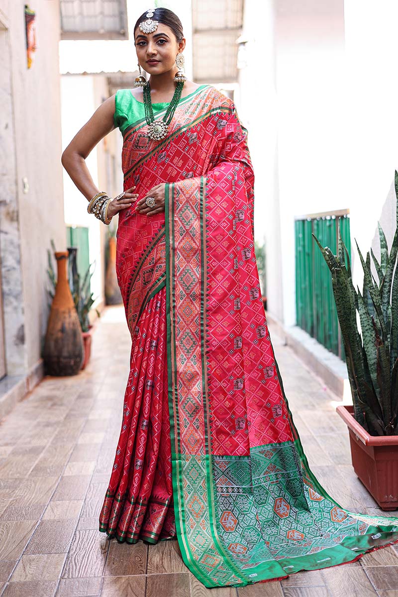 Hypnotic Dark Pink Patola Silk Saree with Intricate Blouse Piece