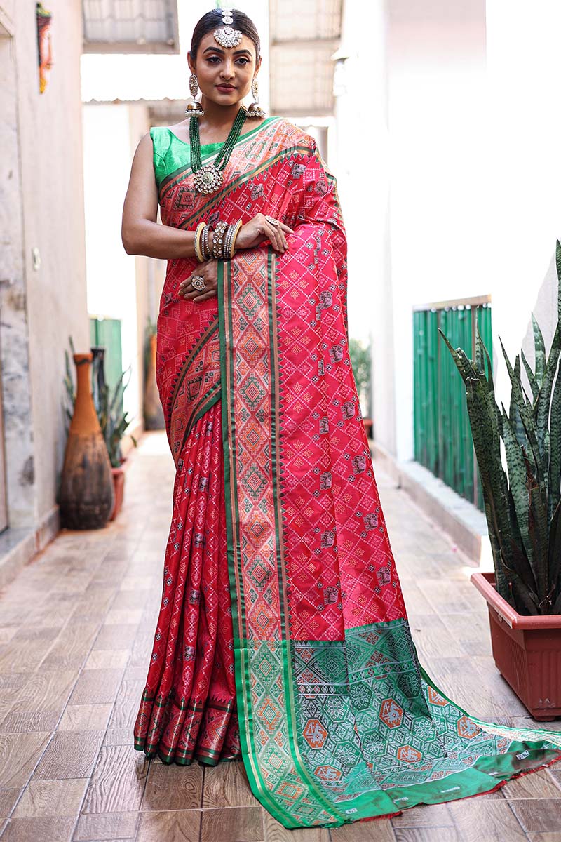 Hypnotic Dark Pink Patola Silk Saree with Intricate Blouse Piece