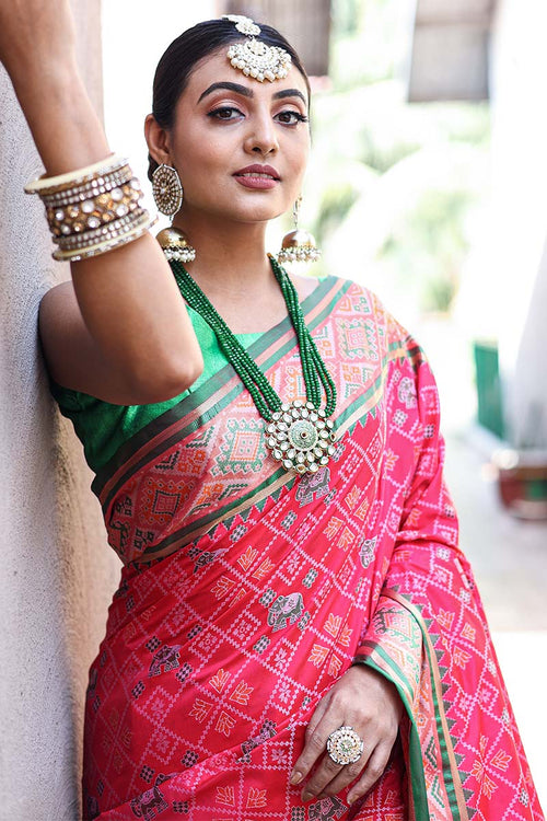 Load image into Gallery viewer, Hypnotic Dark Pink Patola Silk Saree with Intricate Blouse Piece
