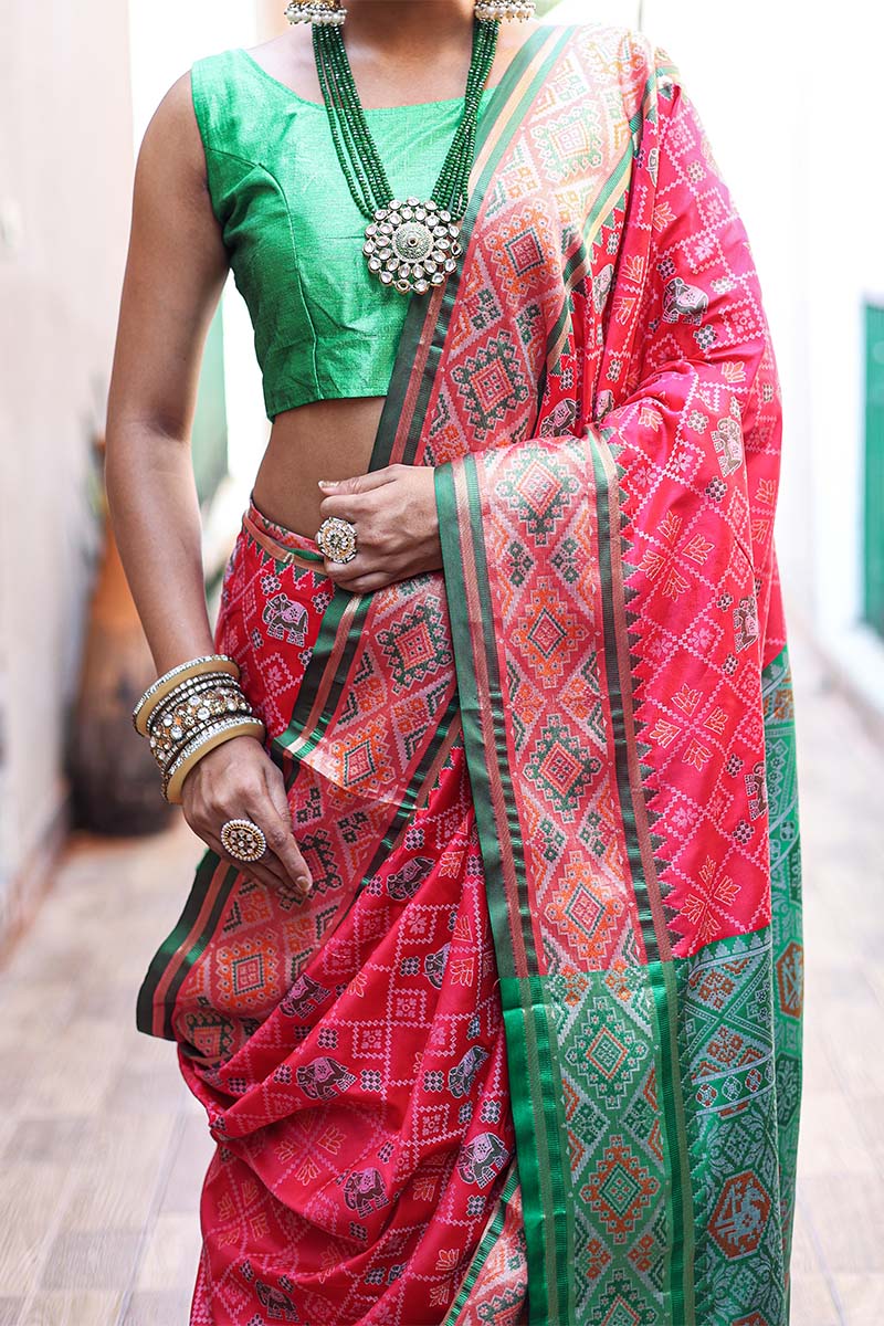 Hypnotic Dark Pink Patola Silk Saree with Intricate Blouse Piece