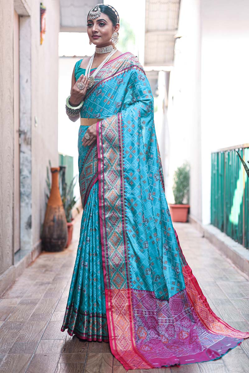 Mesmerising Firozi Patola Silk Saree with Appealing Blouse Piece