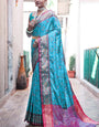 Mesmerising Firozi Patola Silk Saree with Appealing Blouse Piece