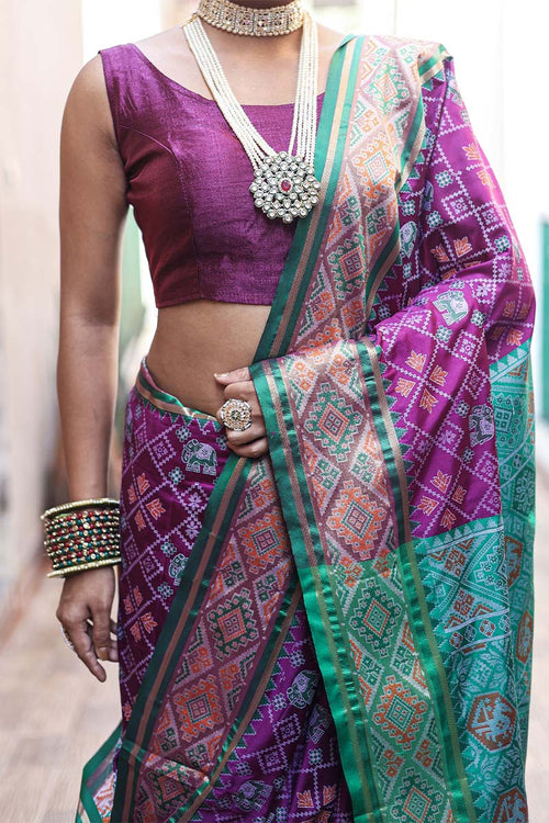 Load image into Gallery viewer, Fancifull Purple Patola Silk Saree with Traditional Blouse Piece
