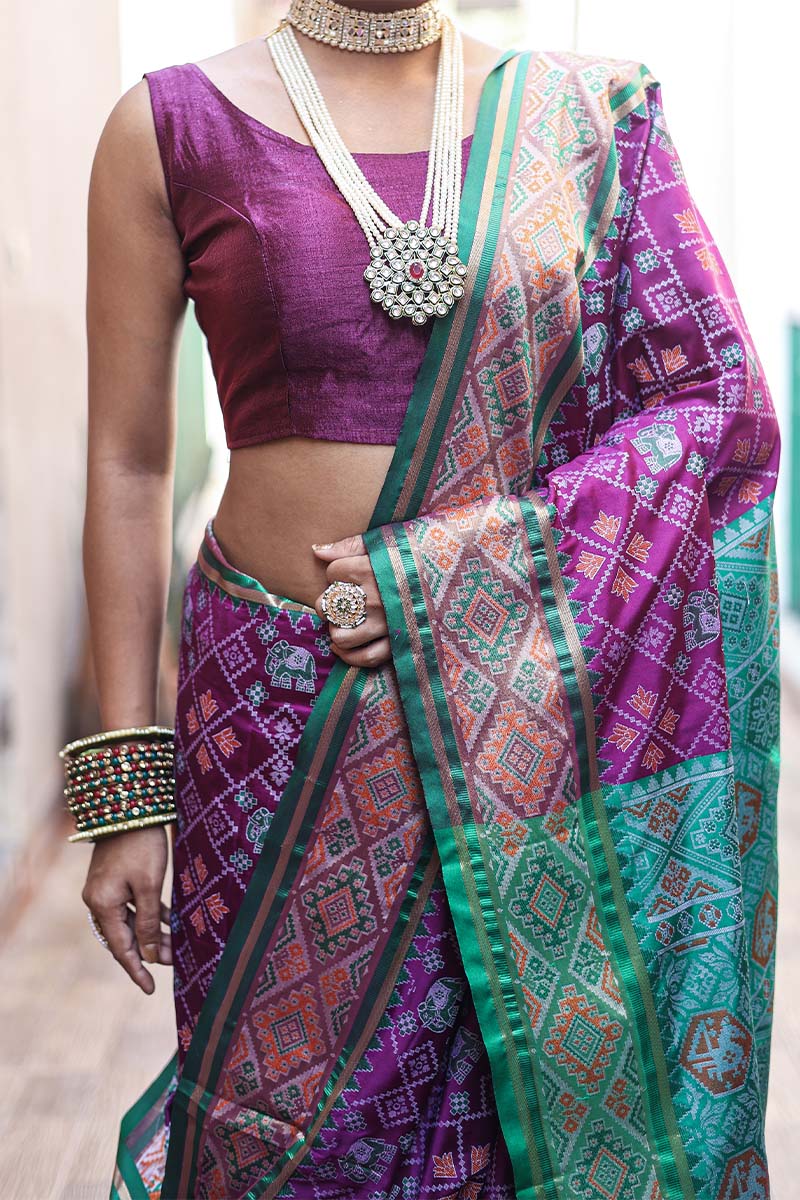 Fancifull Purple Patola Silk Saree with Traditional Blouse Piece