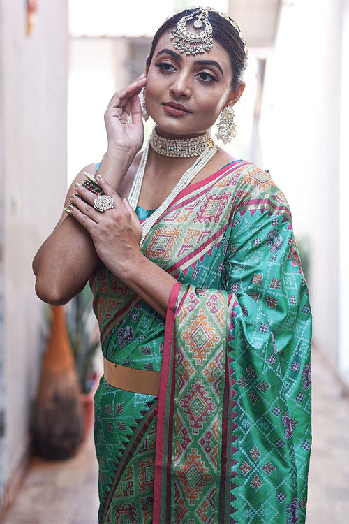 Load image into Gallery viewer, Ebullience Rama Patola Silk Saree with Fugacious Blouse Piece
