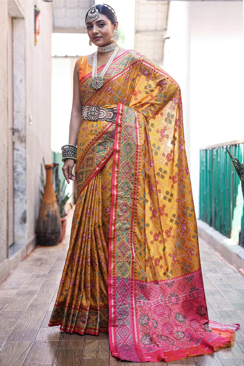 Load image into Gallery viewer, Improbable Yellow Patola Silk Saree with Incomparable Blouse Piece
