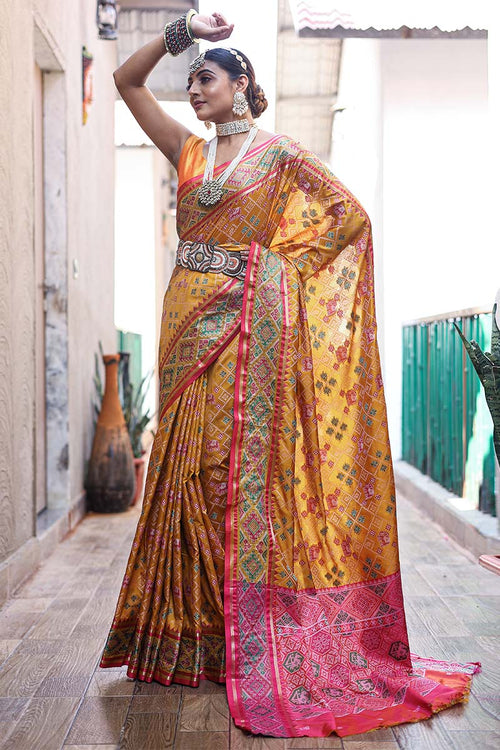 Load image into Gallery viewer, Improbable Yellow Patola Silk Saree with Incomparable Blouse Piece
