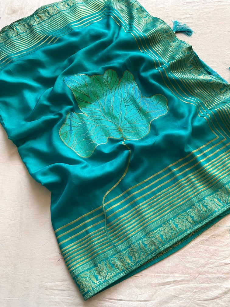 Staring Firozi Soft Banarasi Silk Saree With Jazzy Blouse Piece