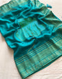 Staring Firozi Soft Banarasi Silk Saree With Jazzy Blouse Piece