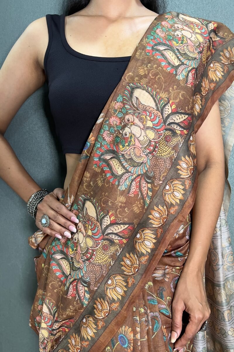 Sizzling Brown Kalamkari Printed Saree With Charming Blouse Piece