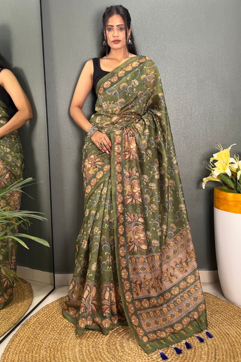 Captivating Green Kalamkari Printed Saree With Prominent Blouse Piece