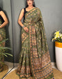 Captivating Green Kalamkari Printed Saree With Prominent Blouse Piece