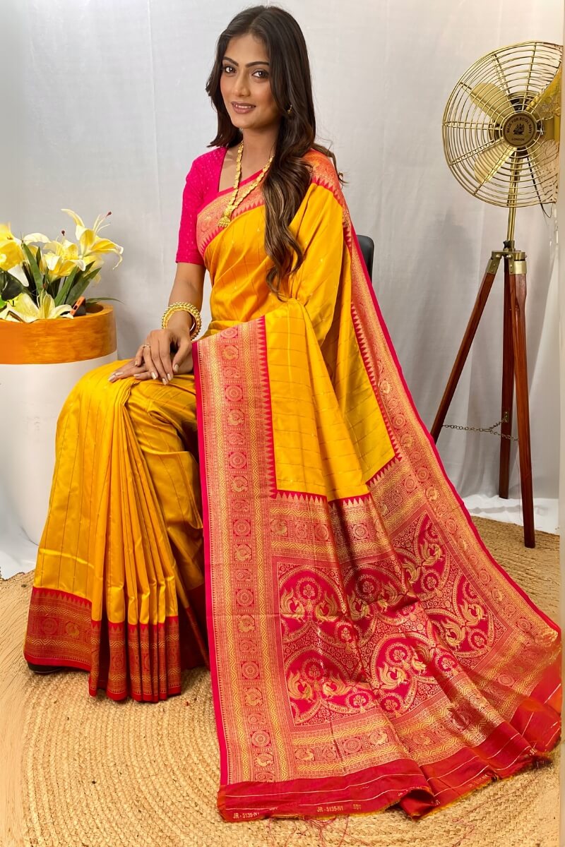 Enthralling Yellow Soft Banarasi Silk Saree With Aplomb Blouse Piece