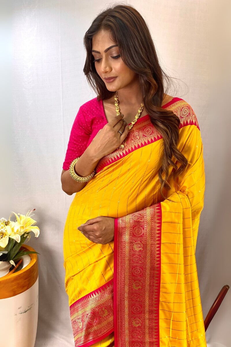 Enthralling Yellow Soft Banarasi Silk Saree With Aplomb Blouse Piece