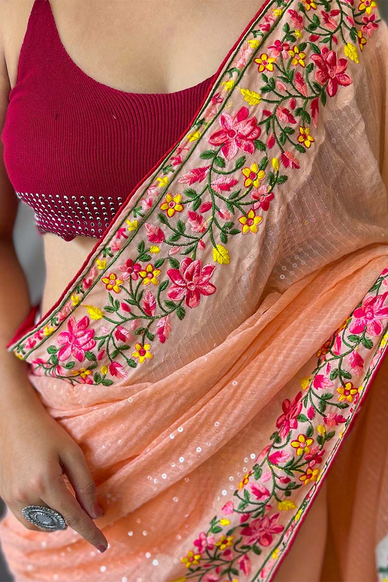 Quintessential Peach Sequence Work Georgette Saree With Forbearance Blouse Piece