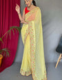 Glowing Yellow Sequence Work Georgette Saree With Prominent Blouse Piece