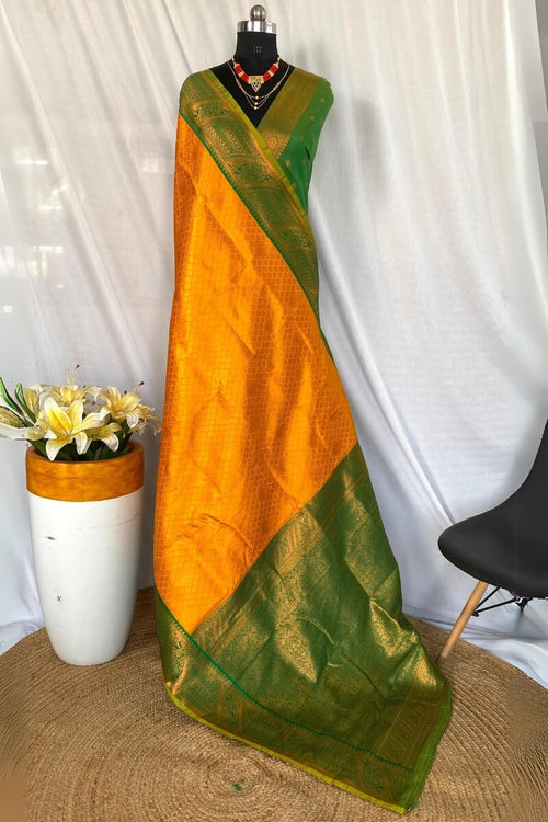 Load image into Gallery viewer, Flattering Mustard Kanjivaram Silk Saree With Innovative Blouse Piece
