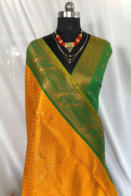 Load image into Gallery viewer, Flattering Mustard Kanjivaram Silk Saree With Innovative Blouse Piece
