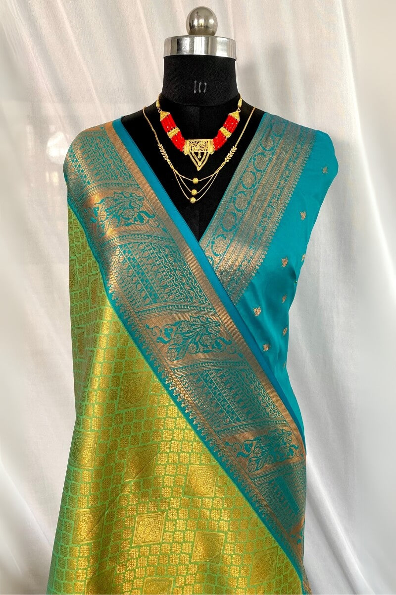 Jazzy Parrot Kanjivaram Silk Saree With Exceptional Blouse Piece