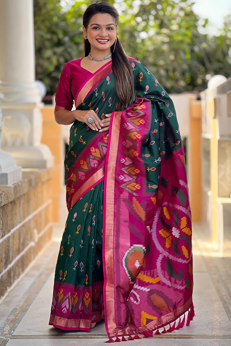 Ephemeral Dark Green Soft Banarasi Silk Saree With Elision Blouse Piece