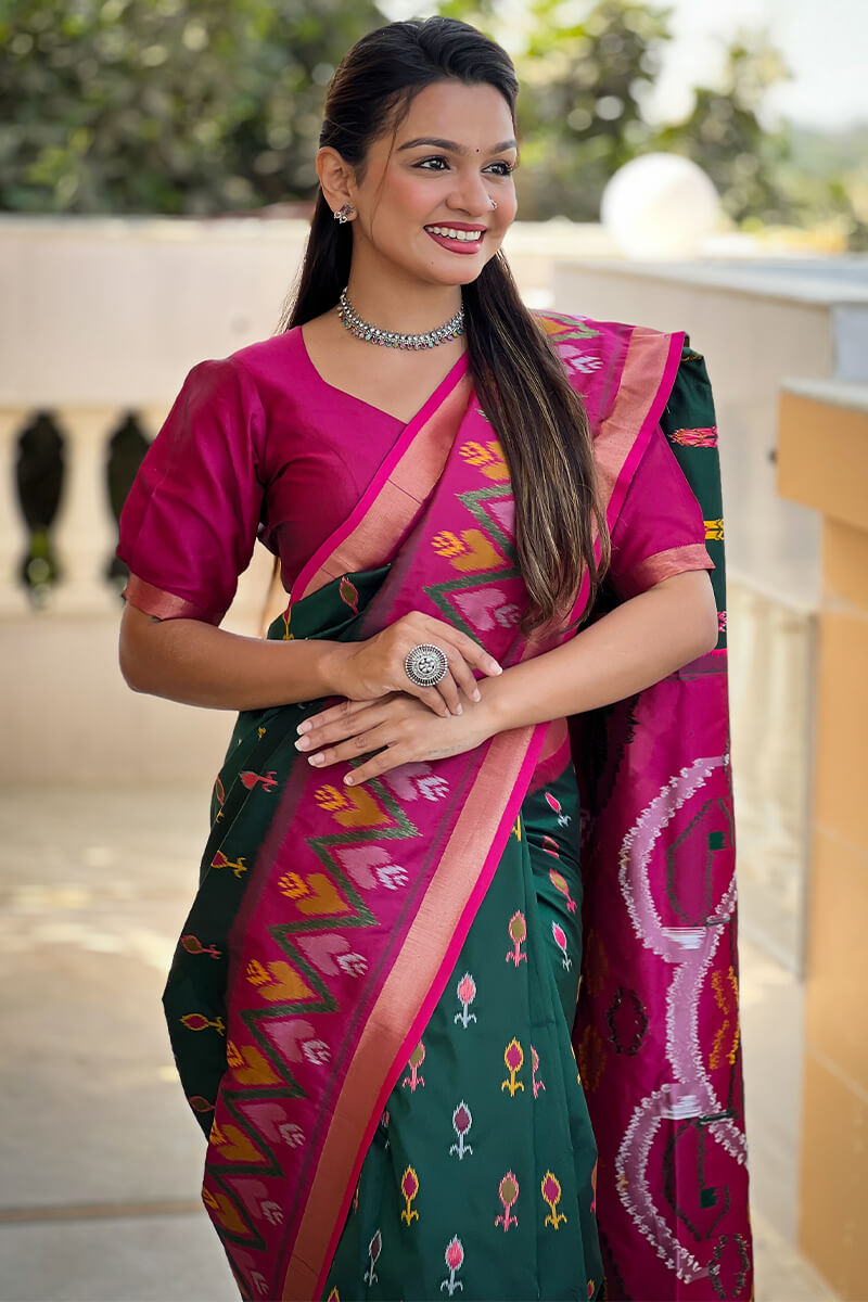 Ephemeral Dark Green Soft Banarasi Silk Saree With Elision Blouse Piece