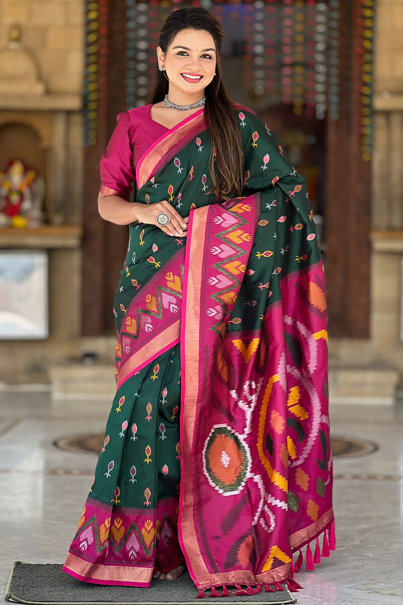 Ephemeral Dark Green Soft Banarasi Silk Saree With Elision Blouse Piece