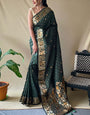 Nemesis Dark Green Soft Banarasi Silk Saree With Quintessential Blouse Piece